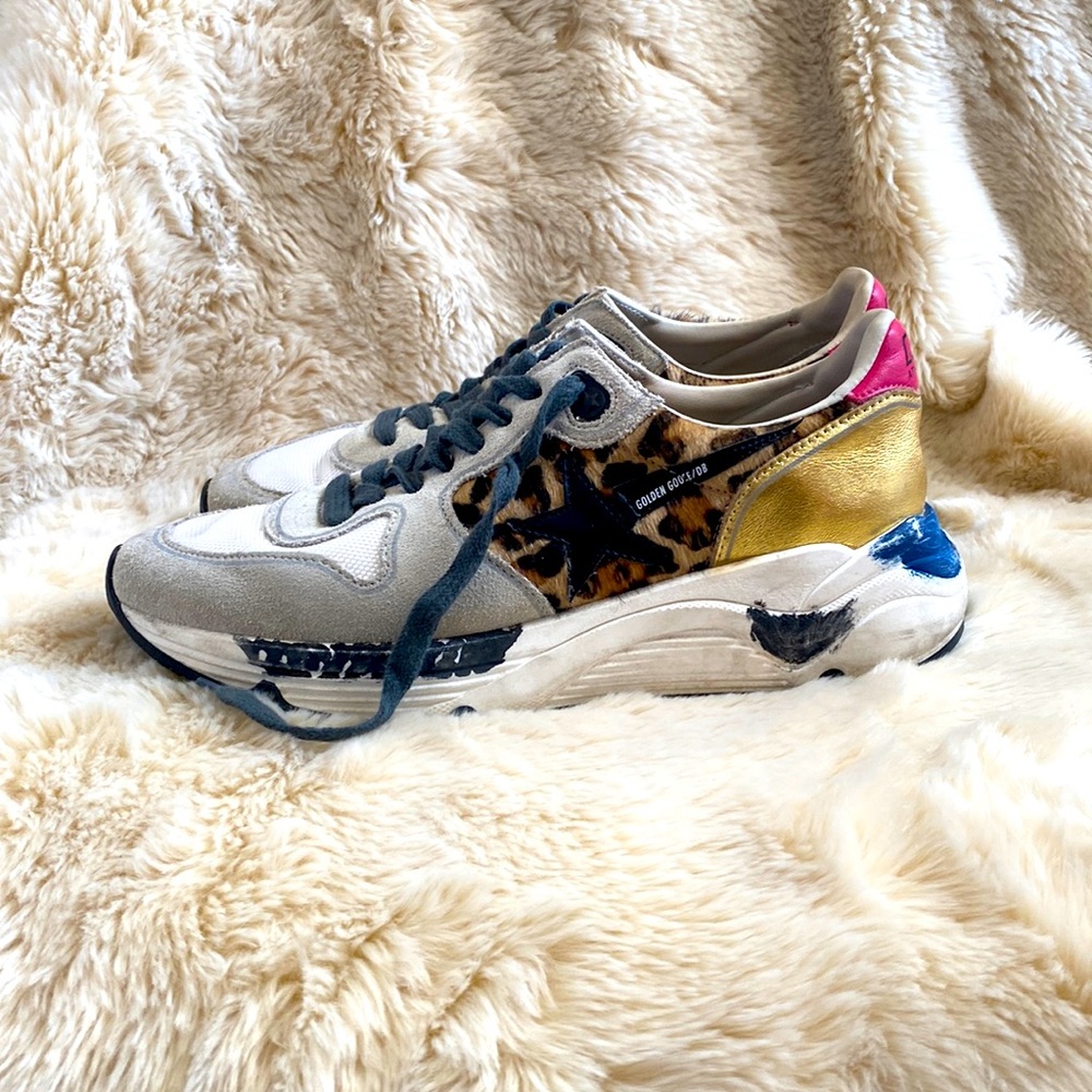Size 8 Golden Goose running style shoes.